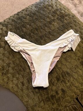 White Ribbed Bikini Bottom with Light Pink Lining. Reversible